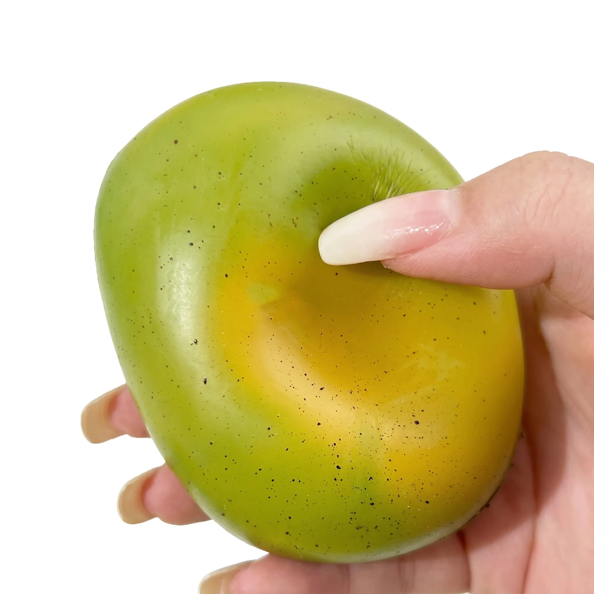 Crunchy color-changing mango squishy being pressed and squeezed showing color change on white background by MimiSquishy