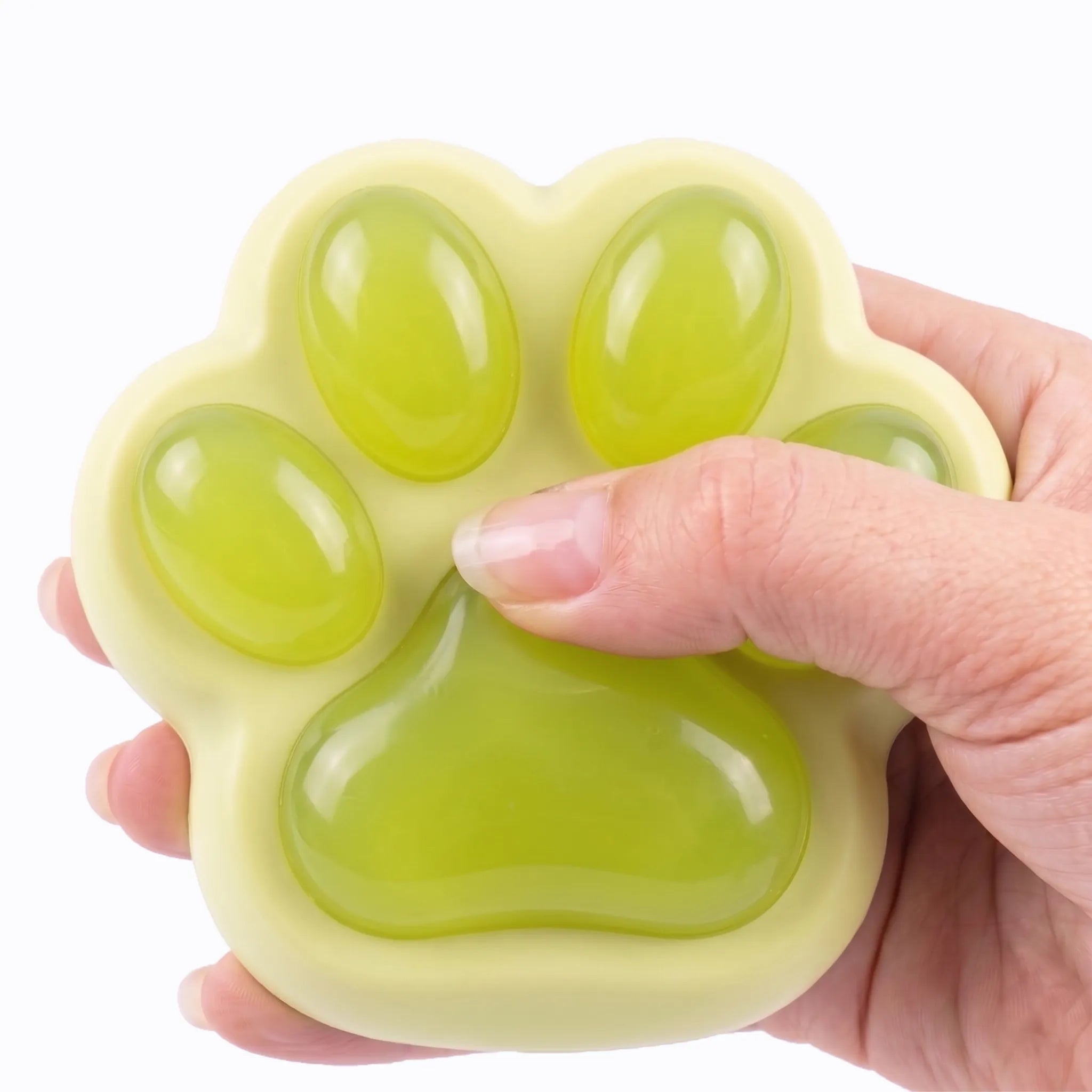 Green cat paw squishy toy being pressed and squeezed on white background by MimiSquishy