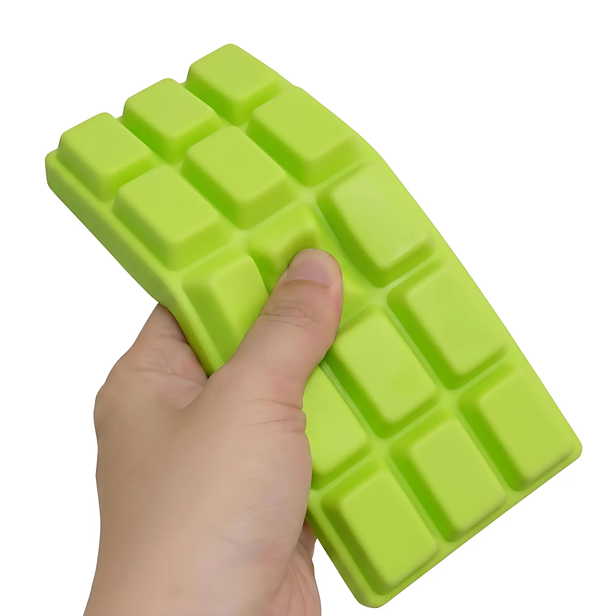 Light green chocolate bar squishy toy being pressed and squeezed on white background by MimiSquishy