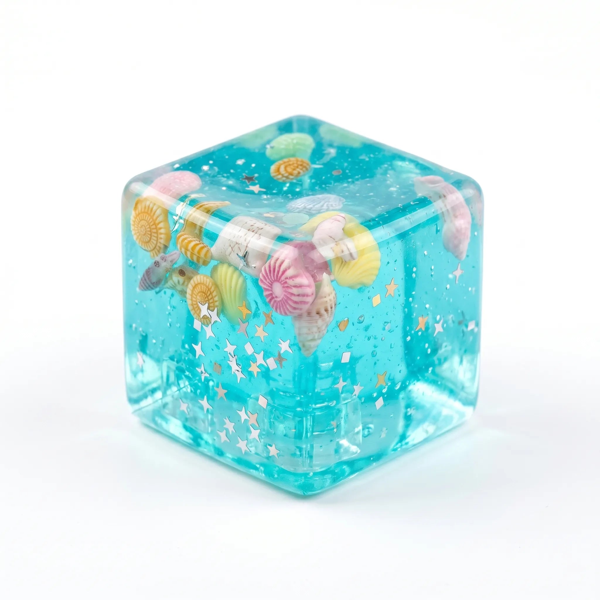Ocean cube squishy toy by MimiSquishy on white background