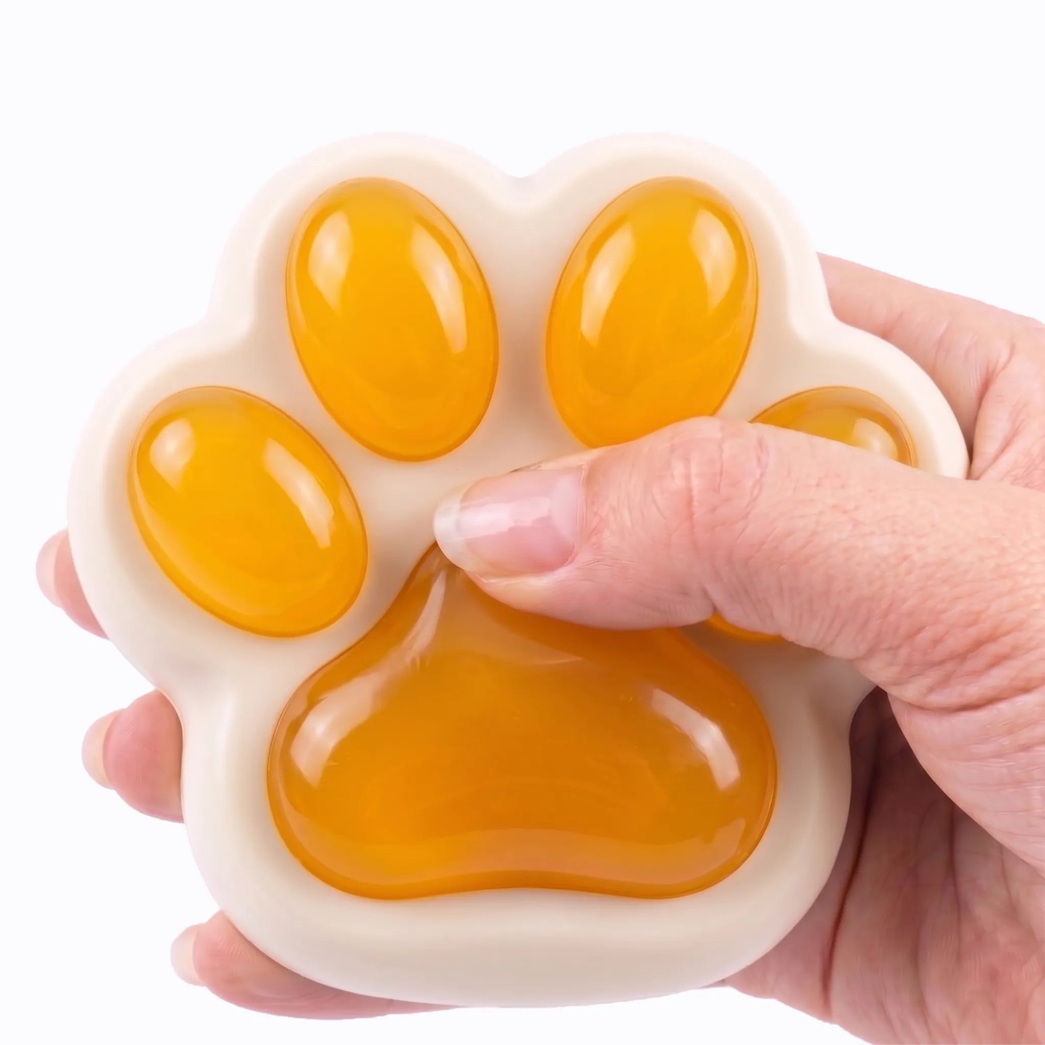 Orange cat paw squishy toy being pressed and squeezed on white background by MimiSquishy