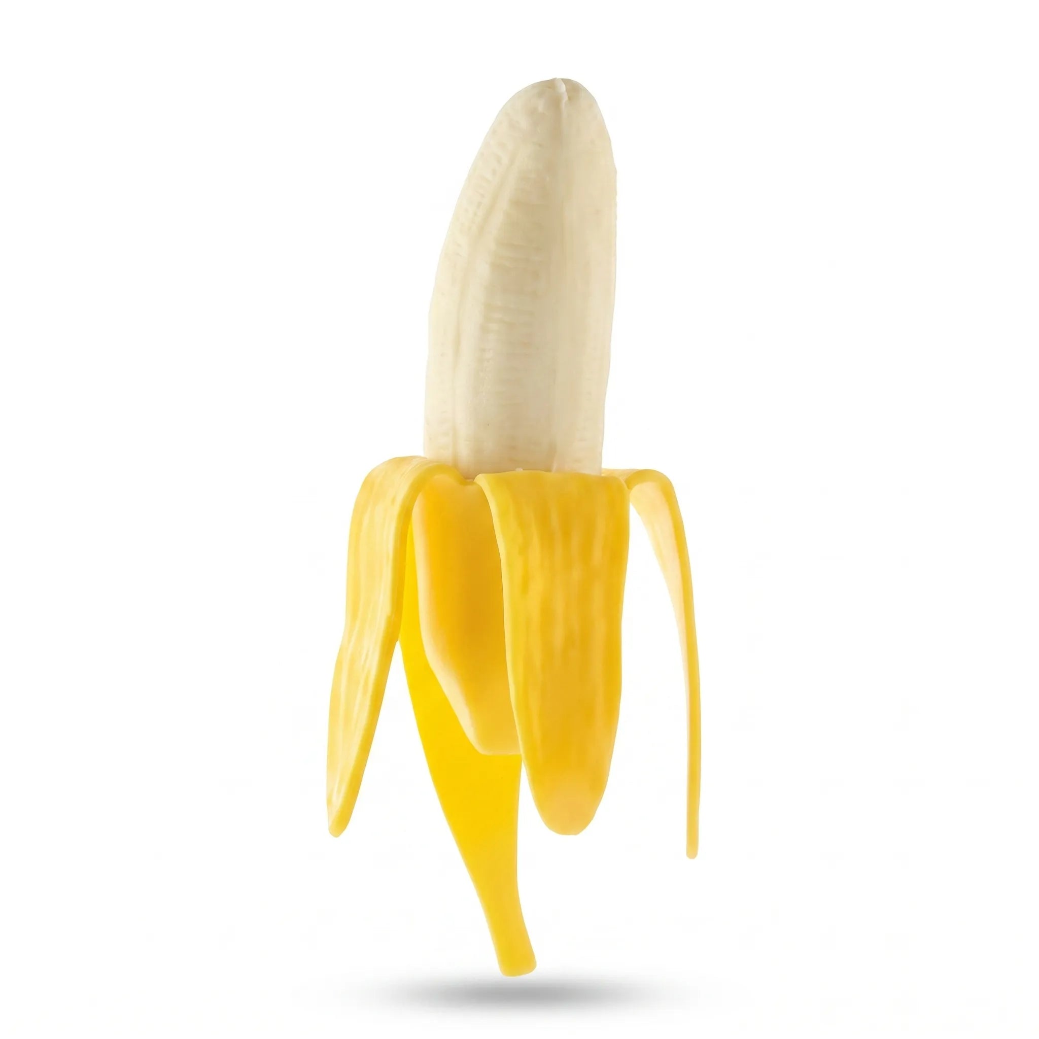 Peeled banana squishy toy by MimiSquishy on white background