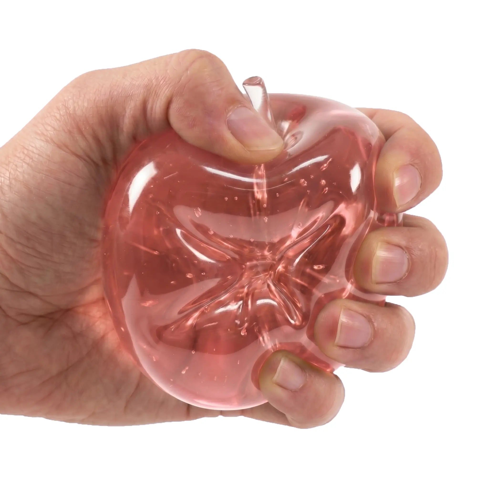 Hands squeezing a soft pink apple squishy stress ball by MimiSquishy