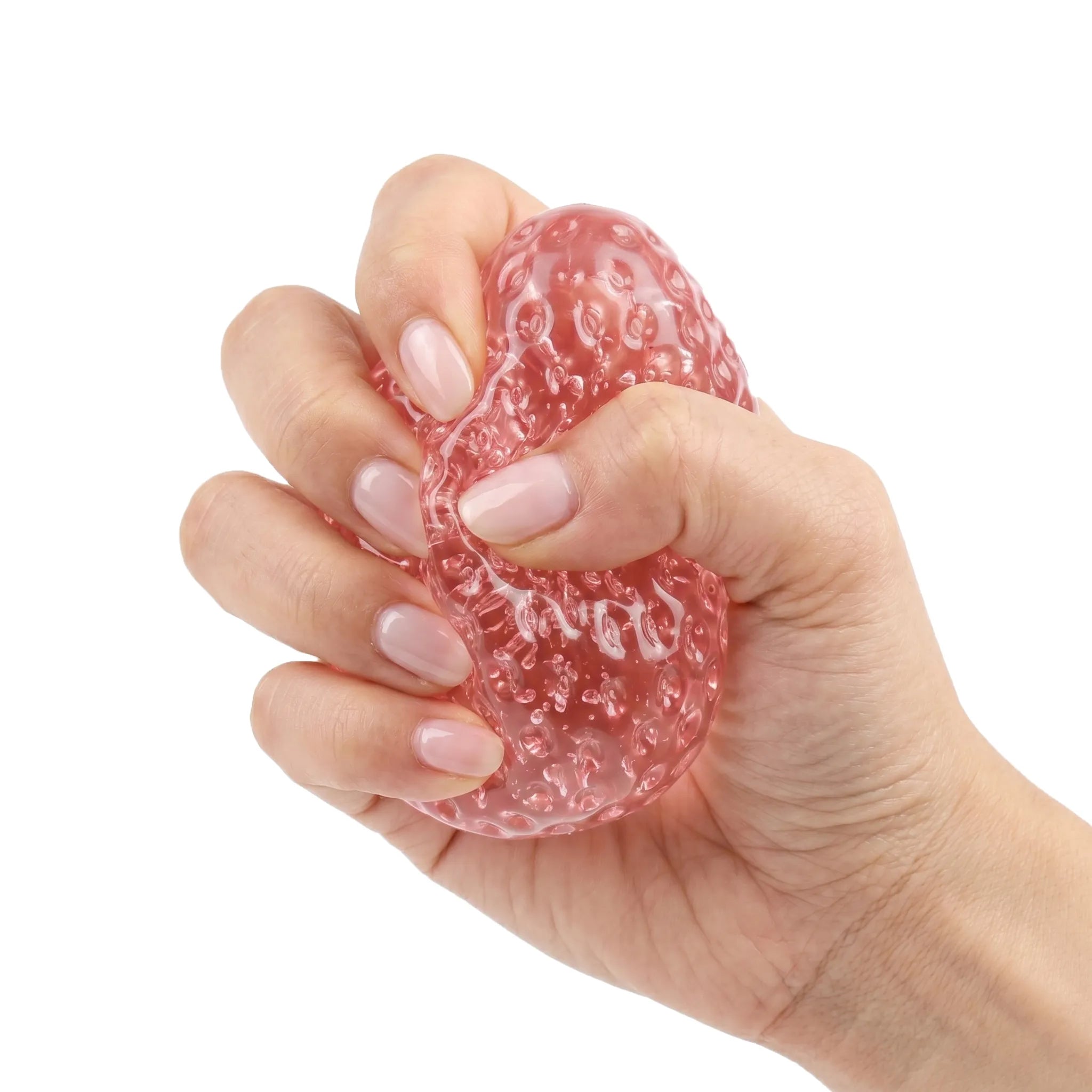 Hands squeezing a soft crystal pink strawberry taba squishy by MimiSquishy