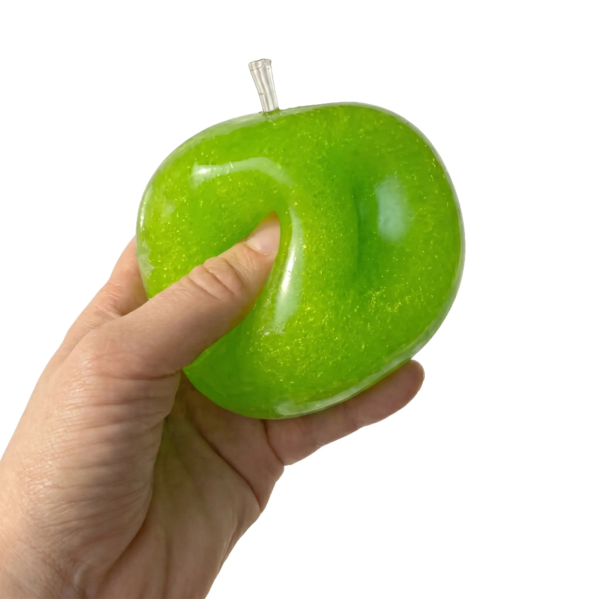 Hand squeezing a shiny green smoothie apple squishy showing its satisfying texture by MimiSquishy