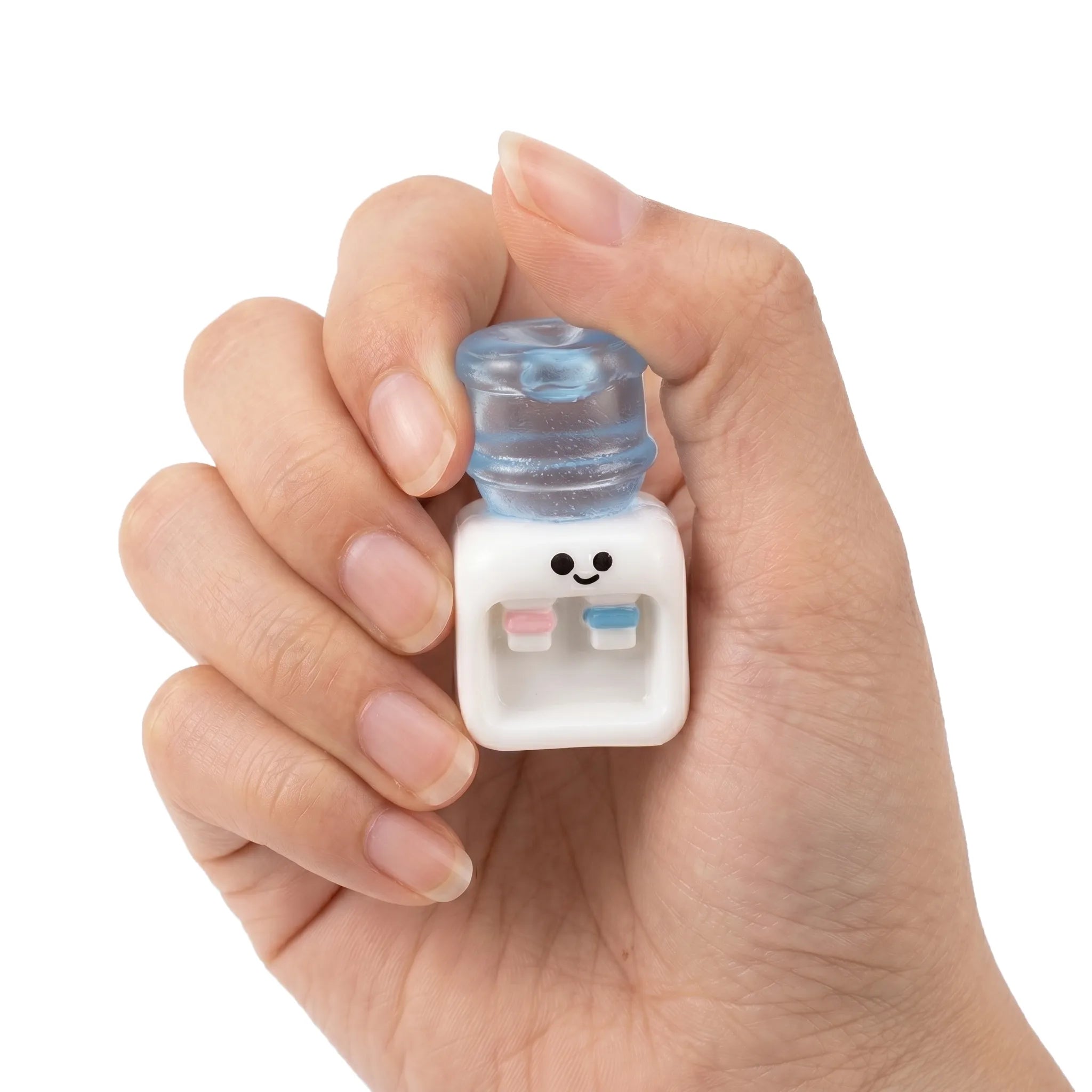 Hand squeezing a tiny cute water dispenser squishy stress relief toy by MimiSquishy